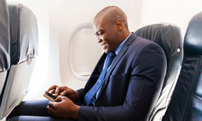 man on plane with mobile device, Xerox, Connect Key, Workplace Central, PA, Xerox, HP, Brother, Epson, Copier, Printer, MFP, Sales, Service, Supplies, Office, Furniture, Copy Center